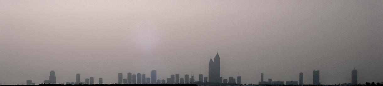 Dubai skyline through the desert haze