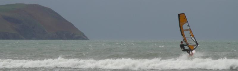 Henning heading out for a windsurf at Pembrokeshire